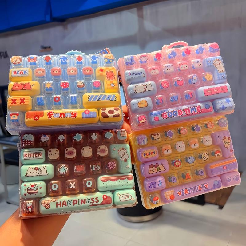 พวงกุญแจบีบคลายเครียด 26 ปุ่ม  - Mini Backpack Purse บทวิจารณ์และราคา